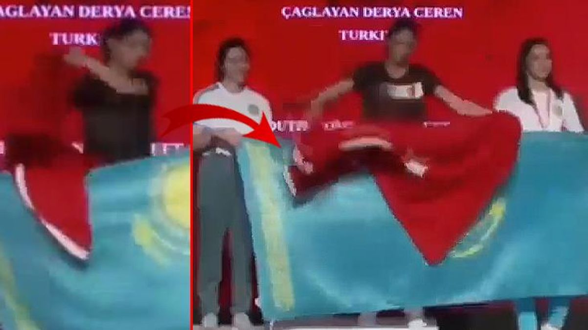 Kürsüde bayrak gerginliği Milli sporcumuz Türk bayrağıyla ders verdi